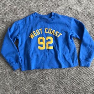 **NEVER WORN** SIZE M CROPPED BLUE SWEATSHIRT